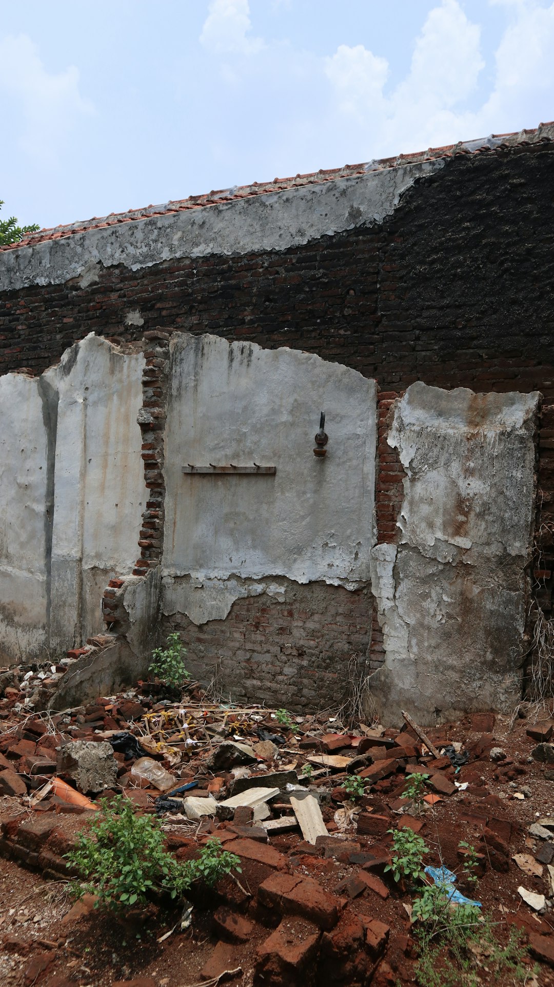 The Art of Drawing Readers In: Your attractive post title goes here ruined-brick-building-with-debris-and-overgrown-plants-vk9luztic7c